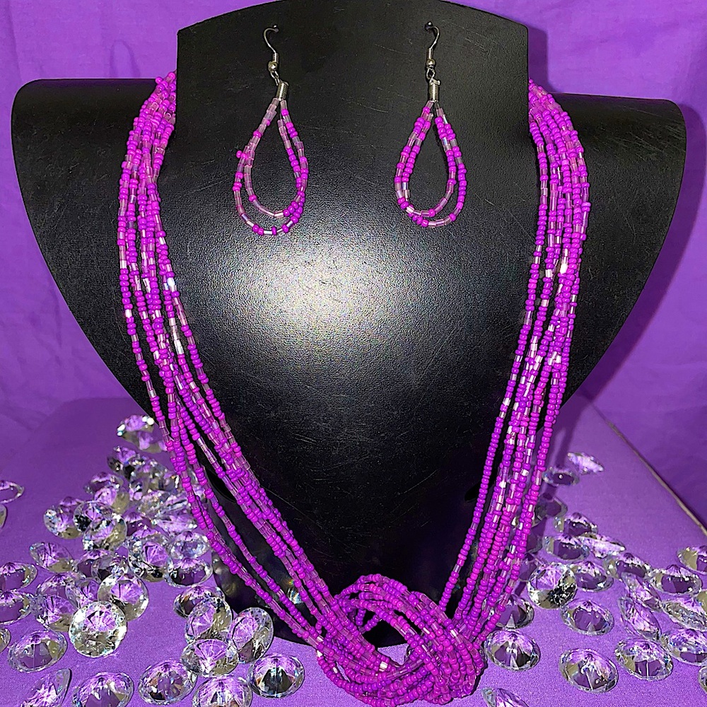 Crossed Beaded necklace and earrings.